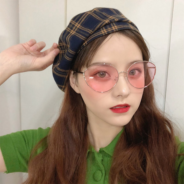 Μοντέρνα γυναικεία στρογγυλά γυαλιά με λεπτό σκελετό