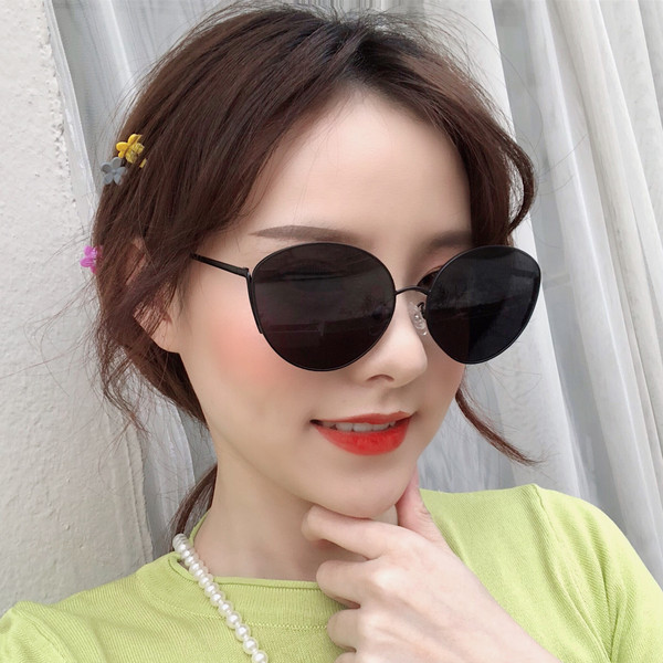 Μοντέρνα γυναικεία στρογγυλά γυαλιά με λεπτό σκελετό