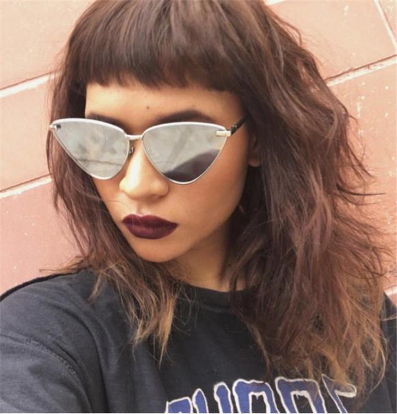 Modernas sieviešu brilles ar nestandarta formu un spoguļa efektu