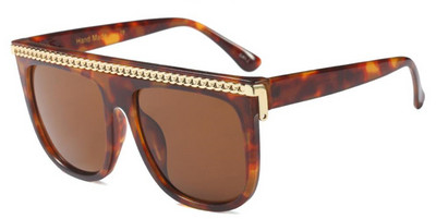 Modernas sieviešu brilles ar metāla elementu