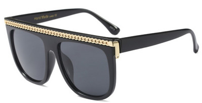 Modernas sieviešu brilles ar metāla elementu