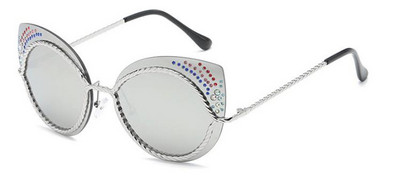 Нов модел слънчеви очила с метални рамки и декорация камъни