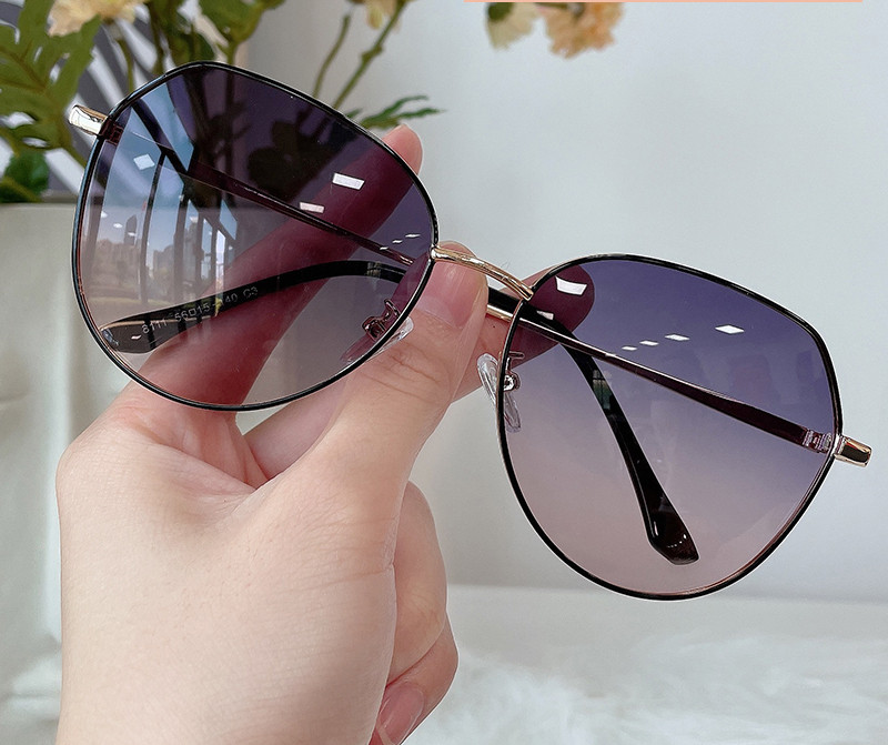 Модерни слънцезащитни очила за жени с тънка метална рамка