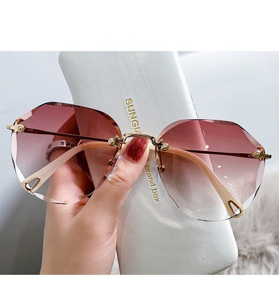 Ochelari de soare rotunzi de actualitate pentru femei, cu o ramă subțire