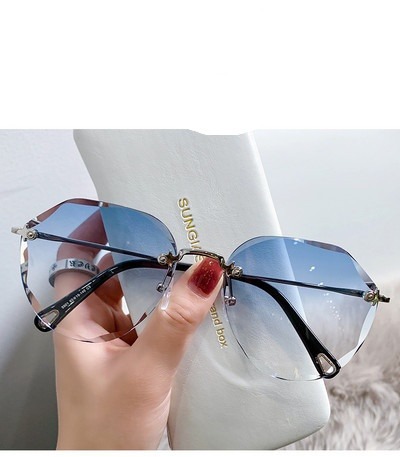 Ochelari de soare rotunzi de actualitate pentru femei, cu o ramă subțire