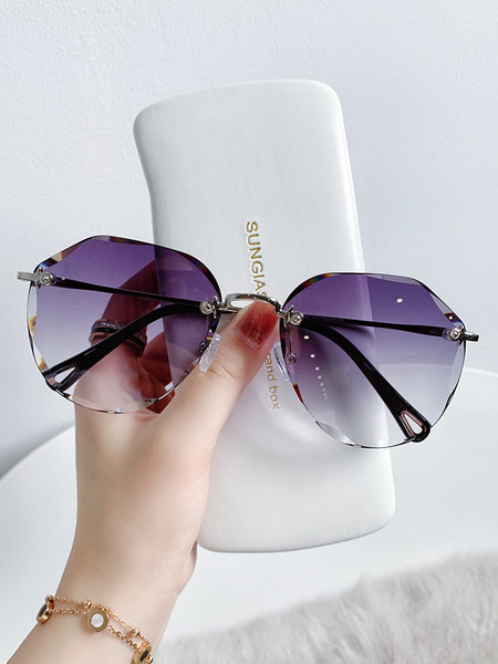 Sieviešu saulesbrilles ar plānu rāmi un krāsainām lēcām