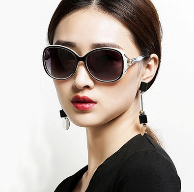 Stilīgas polarizētas sieviešu saulesbrilles apaļā formā