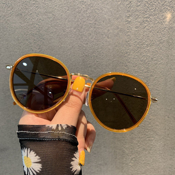 Stilīgas sieviešu apaļas brilles retro stilā ar plānu rāmi