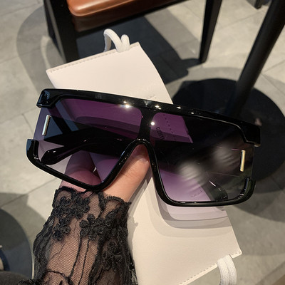 Дамски слънчеви очила в нестандартна форма с широка рамка