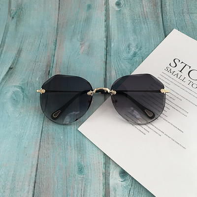 Γυναικεία στρογγυλά γυαλιά με λεπτό πλαίσιο