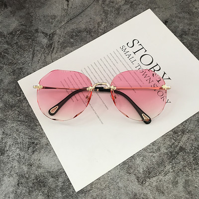 Γυναικεία στρογγυλά γυαλιά με λεπτό πλαίσιο