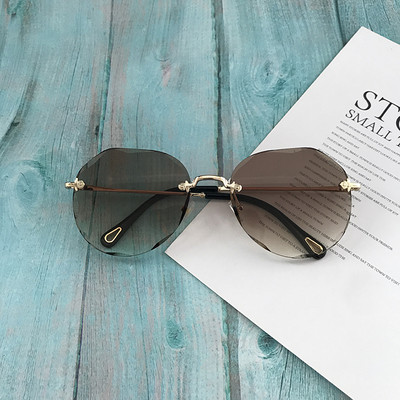 Γυναικεία στρογγυλά γυαλιά με λεπτό πλαίσιο