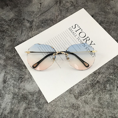 Γυναικεία στρογγυλά γυαλιά με λεπτό πλαίσιο