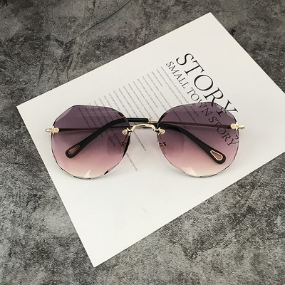 Γυναικεία στρογγυλά γυαλιά με λεπτό πλαίσιο