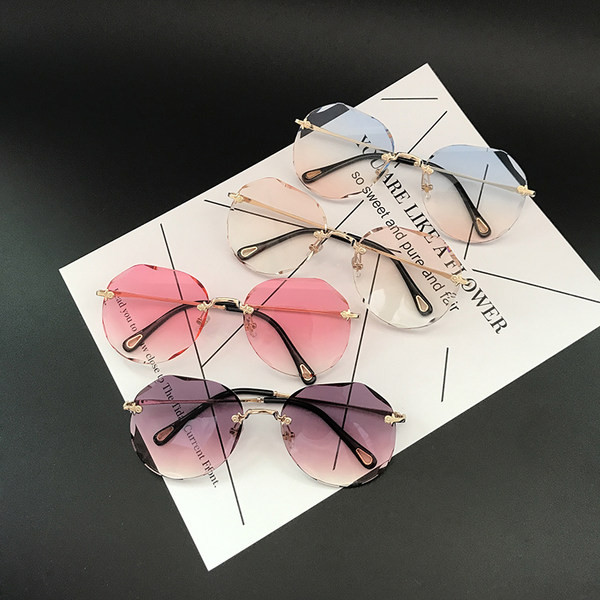 Γυναικεία στρογγυλά γυαλιά με λεπτό πλαίσιο