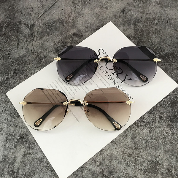 Γυναικεία στρογγυλά γυαλιά με λεπτό πλαίσιο