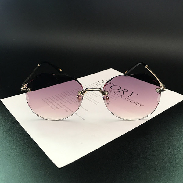 Γυναικεία στρογγυλά γυαλιά με λεπτό πλαίσιο