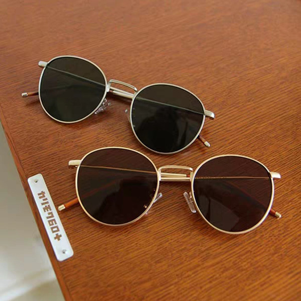 Jauns sieviešu apaļo saulesbriļļu modelis