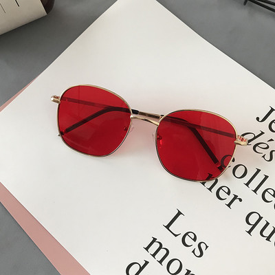 Modernas sieviešu brilles ar apaļu formu un plāniem metāla rāmjiem