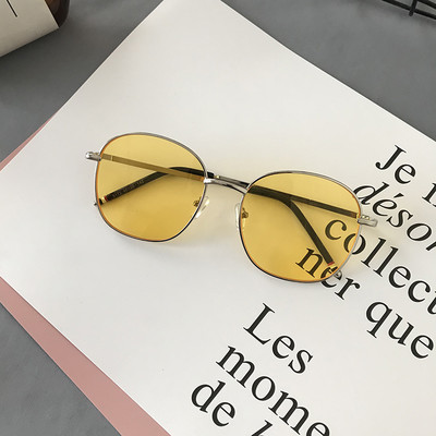 Modernas sieviešu brilles ar apaļu formu un plāniem metāla rāmjiem