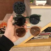 Ochelari de soare moderni cu lentile rotunde si rama din plastic