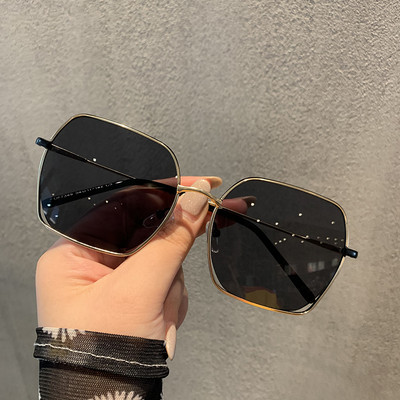 Elegantas sieviešu saulesbrilles ar plānu metāla rāmi