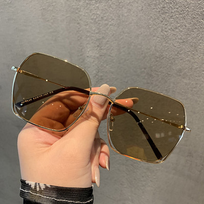 Elegantas sieviešu saulesbrilles ar plānu metāla rāmi