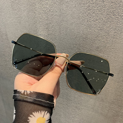 Elegantas sieviešu saulesbrilles ar plānu metāla rāmi