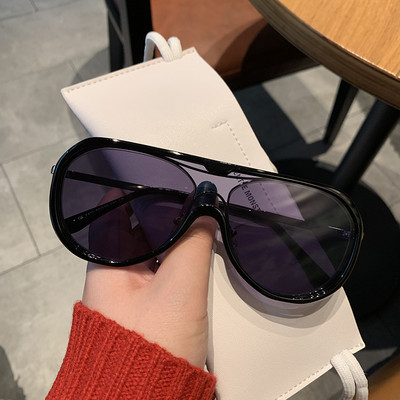 Stilīgas sieviešu saulesbrilles ar plānu ietvaru ovālā formā