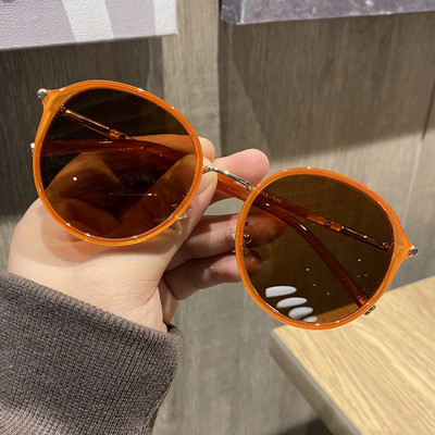 Stilīgas sieviešu brilles apaļā formā ar plānām lencēm