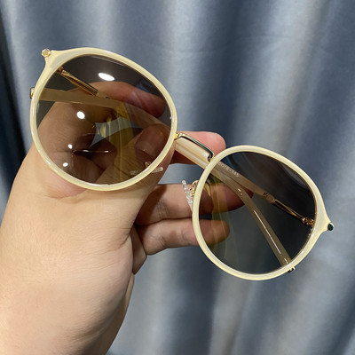 Stilīgas sieviešu brilles apaļā formā ar plānām lencēm