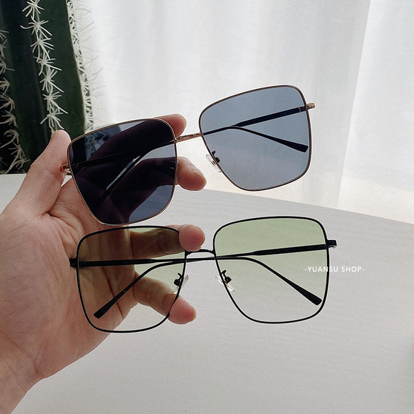 Sieviešu saulesbrilles ar kvadrātveida formu un metāla rāmi