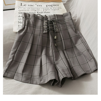 Jauns sieviešu šortu un kaklasaišu modelis ar augstu vidukli