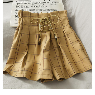 Jauns sieviešu šortu un kaklasaišu modelis ar augstu vidukli