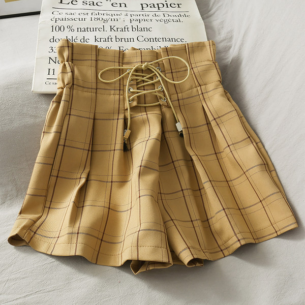 Jauns sieviešu šortu un kaklasaišu modelis ar augstu vidukli