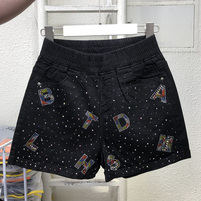 Aktuāli sieviešu šorti ar augstu vidukli un dekoratīviem akmeņiem