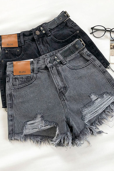 Модерни къси дънки със скъсани мотиви и цип