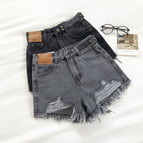 Модерни къси дънки със скъсани мотиви и цип