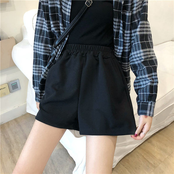 Sieviešu platas bikses ar elastīgu jostasvietu