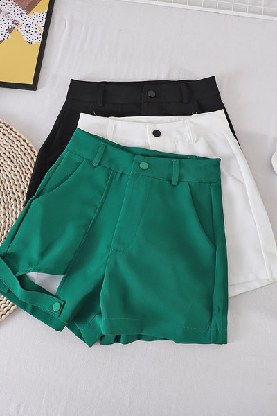 Sieviešu vienkrāsaini šorti ar augstu vidukli un kabatām