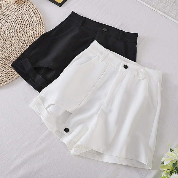 Sieviešu vienkrāsaini šorti ar augstu vidukli un kabatām