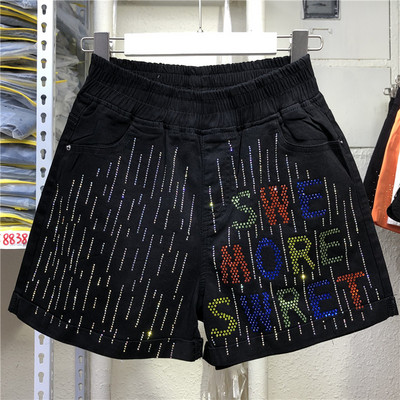 Sieviešu aktuālie šorti ar augstu vidukli un dekoratīviem akmeņiem