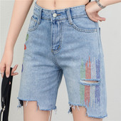 Aktuālās sieviešu džinsa bikses 3/4 garumā ar saplēstiem motīviem