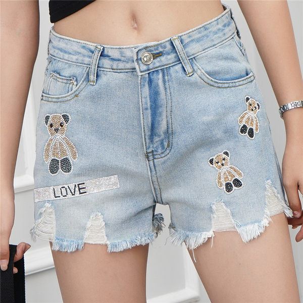 Pantaloni scurți moderni de damă cu motive rupte și aplicații