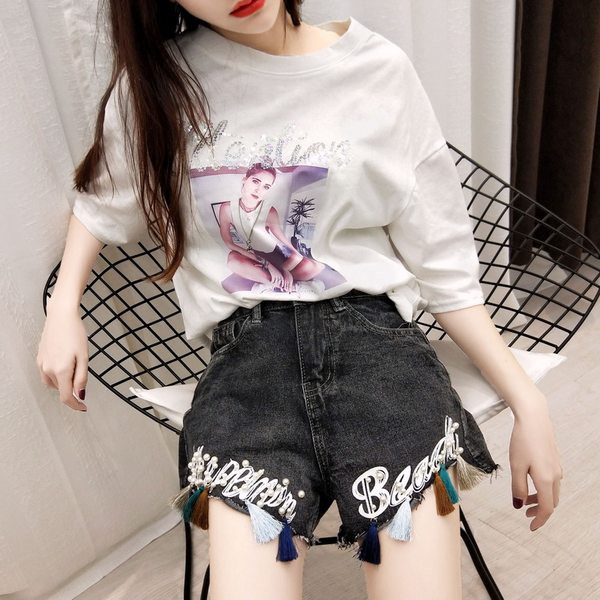 Blugi moderni scurti cu ciucuri si broderie