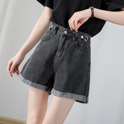 Sieviešu džinsi ar pogām un augstu vidukli