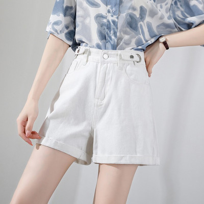 Sieviešu džinsi ar pogām un augstu vidukli