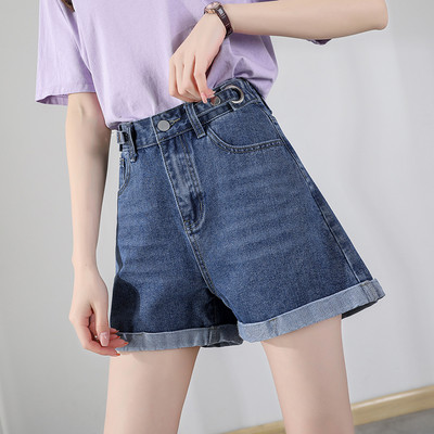 Sieviešu džinsi ar pogām un augstu vidukli