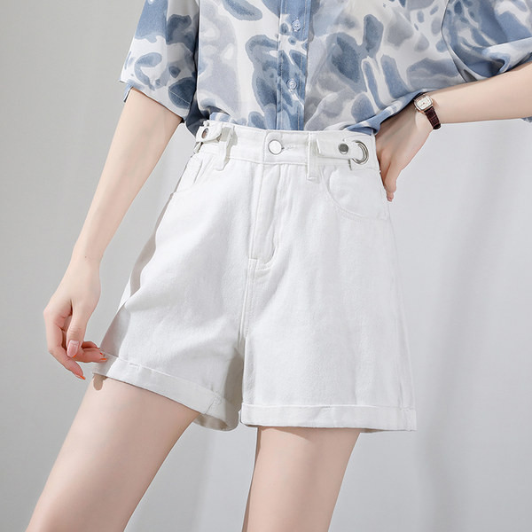 Sieviešu džinsi ar pogām un augstu vidukli