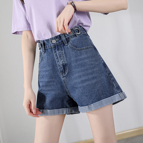 Sieviešu džinsi ar pogām un augstu vidukli